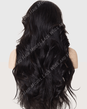 Rear view of a mannequin head displaying a dark brunette lace wig with loose, flowing waves that add volume and texture. The wig's hair cascades down in soft, natural-looking layers, giving a full and dynamic appearance.
